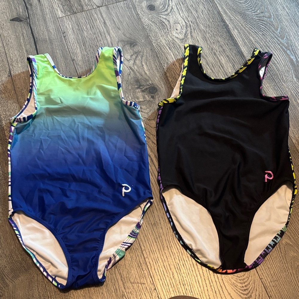Plum gymnastics leotards